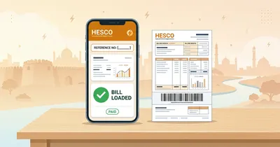 HESCO duplicate bill on a phone screen beside a printed electricity bill